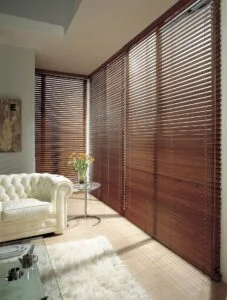 White wooden tier-on-tier window shutters